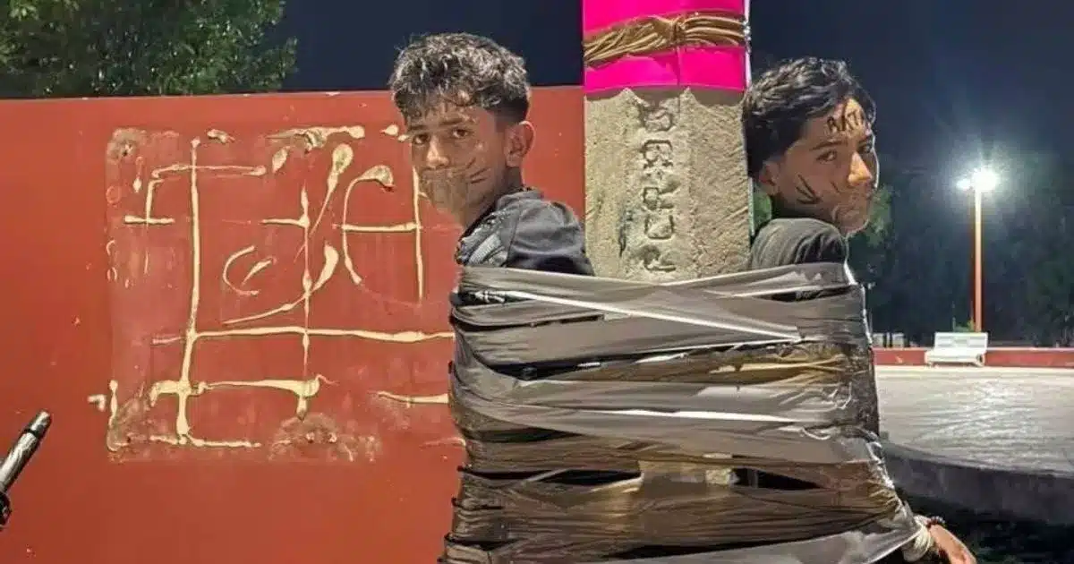 Kẻ gian bị quấn băng keo chặt vào cột điện